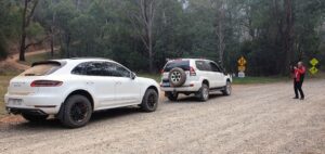 CAUTION man with camera on road. McKenzie-Birrell-Gibbs Porsche and Curic-Bashford Toyota (David McKenzie)